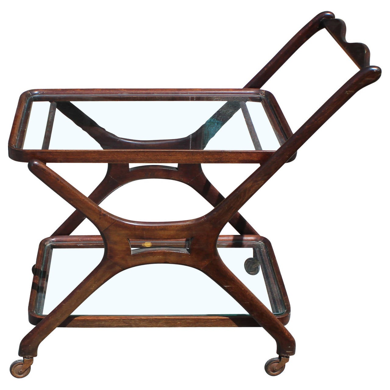 Beautiful sculptural Italian bar cart with two glass shelves. In nice vintage condition, in the style of Ico Parisi.