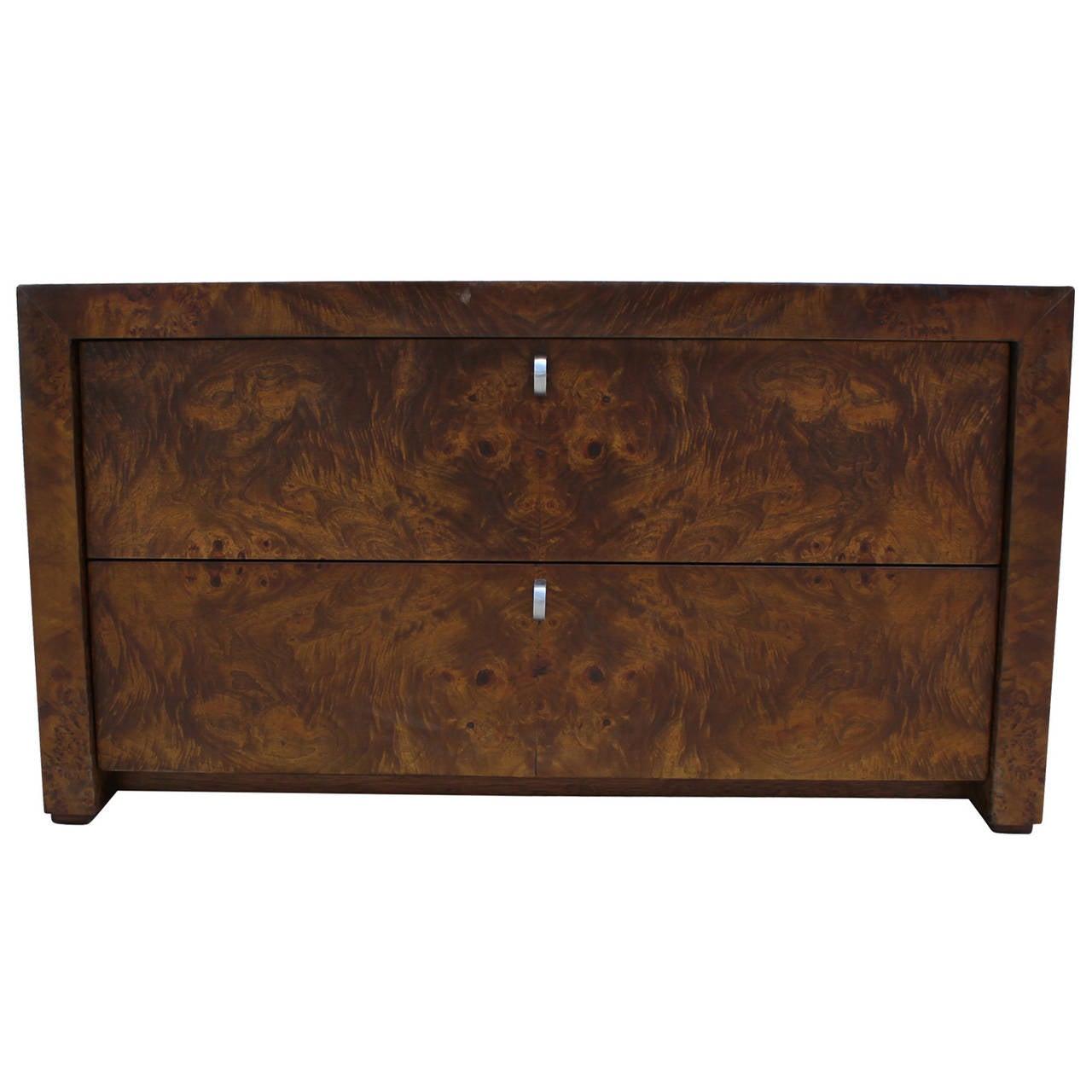 Beautiful chest in burl wood. Delicate, looped handles add visual interest. Chest has two drawers. Perfect as a side table or nightstand.