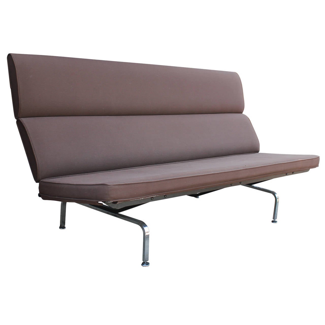 Charles and Ray Eames for Herman Miller 'Compact' sofa with original brown upholstery. Fabric is in good shape, but reupholstery is recommended. Sofa has the iconic three-tiered back and chrome legs.