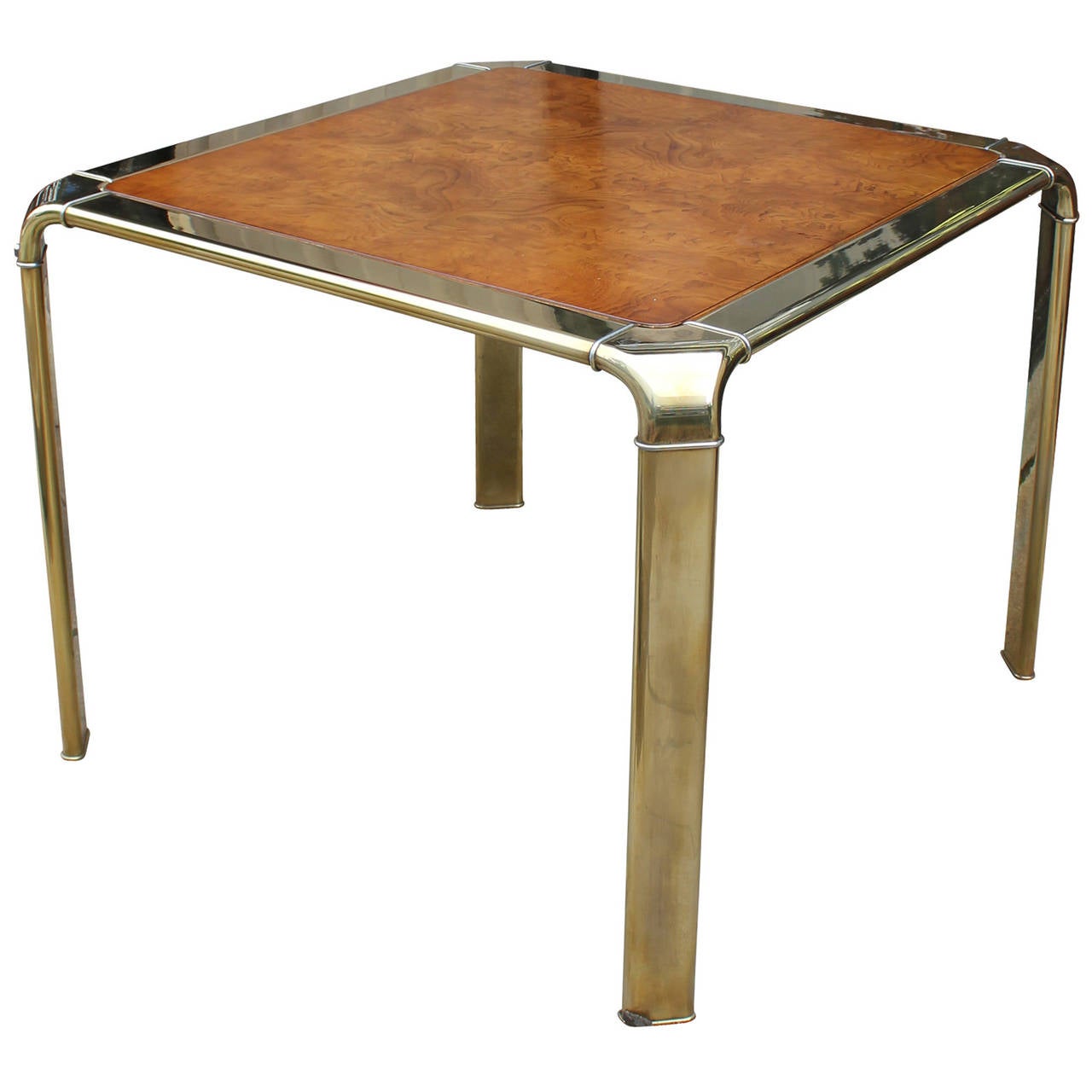 Brass legged and burl wood top table table by Widdicomb. Burl wood has a stunning and dramatic grain. Waterfall edged brass legs show some wear towards the tops. Great used as a dinette or card table.