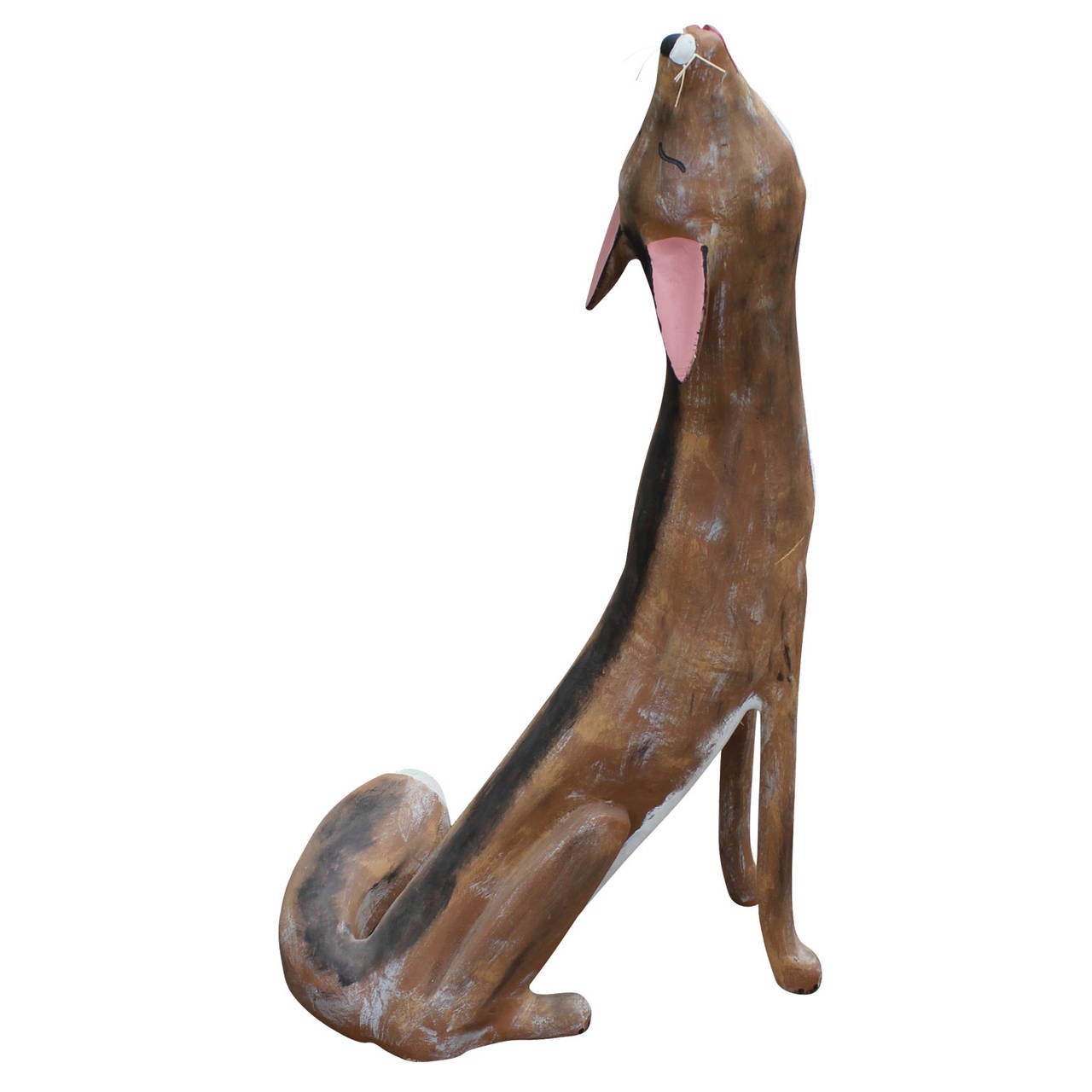 Howling coyote or fox sculpture by artist David Alvarez. Sculpture is hand carved wood and painted.