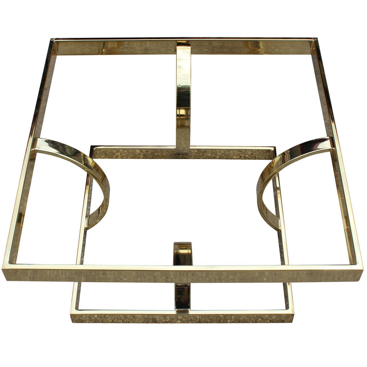 MIlo Baughman style polished brass table base. Coffee table height. Glass tops in various sizes available.