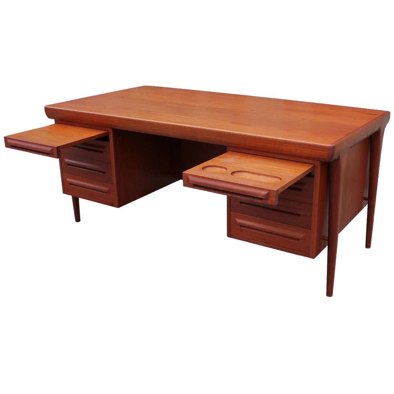 Beautiful Teak executive desk with two sets of drawers and cabinets on the back. Made in denmark circa 1960. Designer Unknown.
