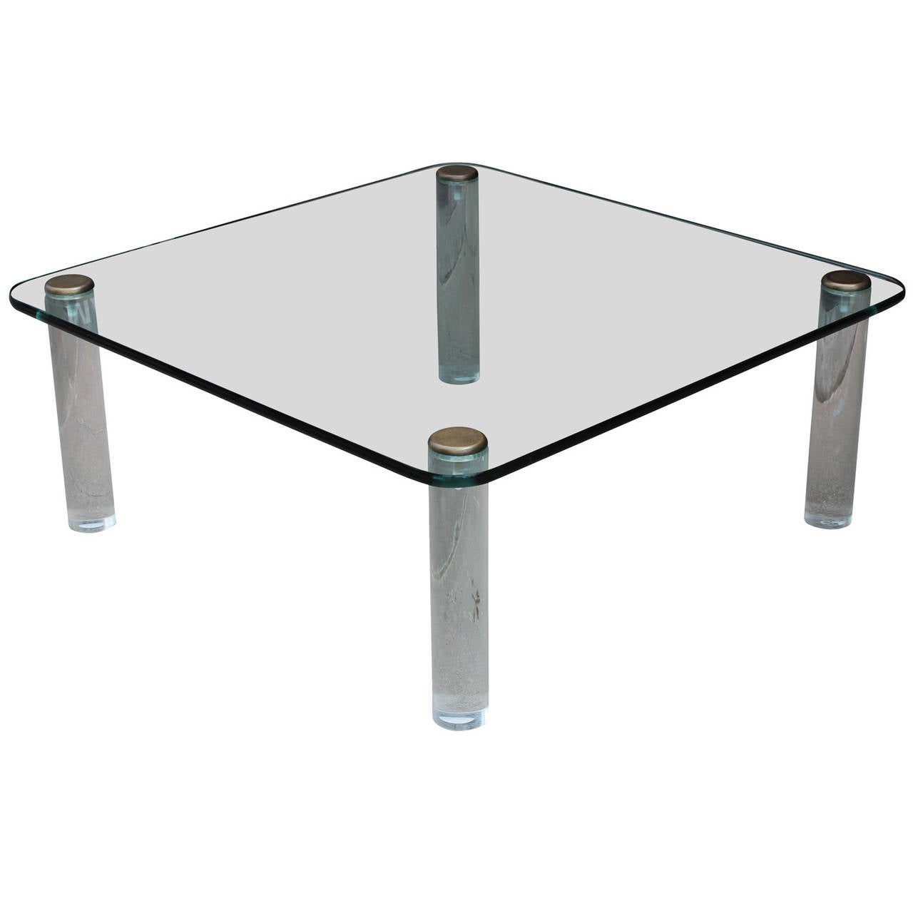 Great Charles Hollis Jones style lucite square coffee table with a glass top. Lucite legs are finished with a heavy solid brass cap. Table is probably made by Pace Collection. In excellent vintage condition.
