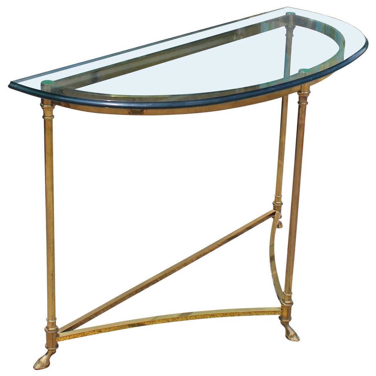 Great Hollywood Regency style La Barge brass and glass demi-lune console table. Table has long delicate legs capped with wonderfully curved hooves.