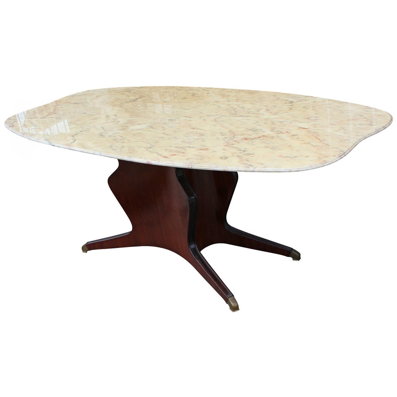 Sculptural Dining or Center table by Osvaldo Borsani Circa 1950. Table sits atop a rosewood base with nice piece of marble on top. Table in is Excellent vintage condition.
