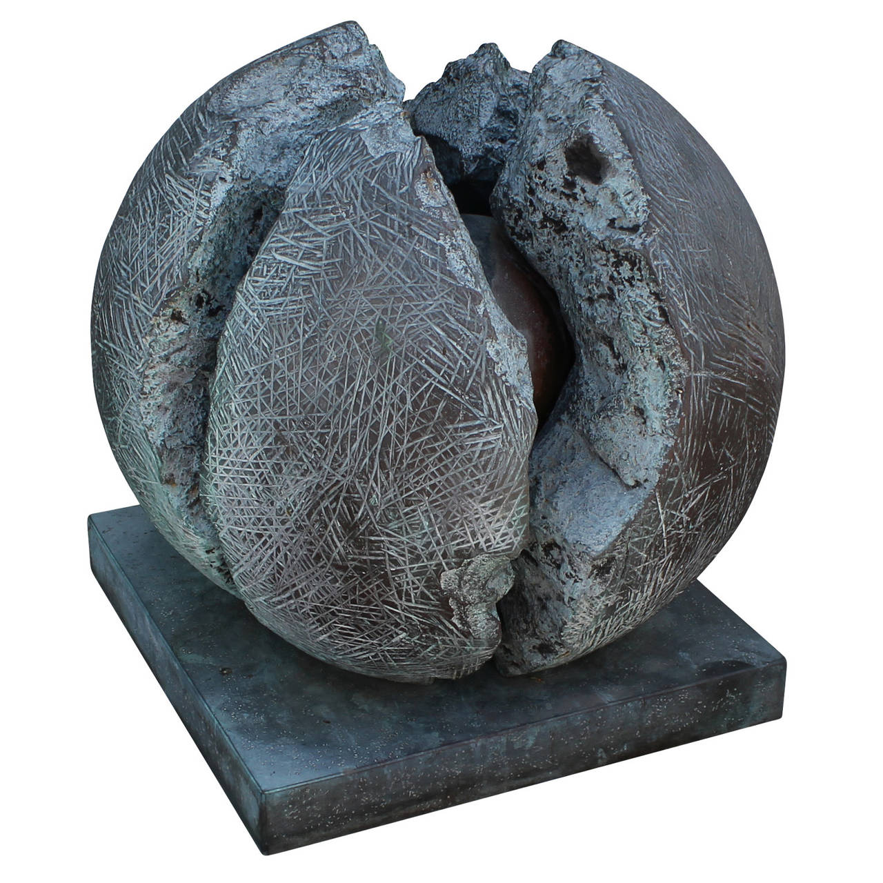 Abstract bronze sculpture by American artist Arther Williams. Sculpture depicts a large sphere cracking open to reveal a smaller sphere. Piece has a lovely patina.