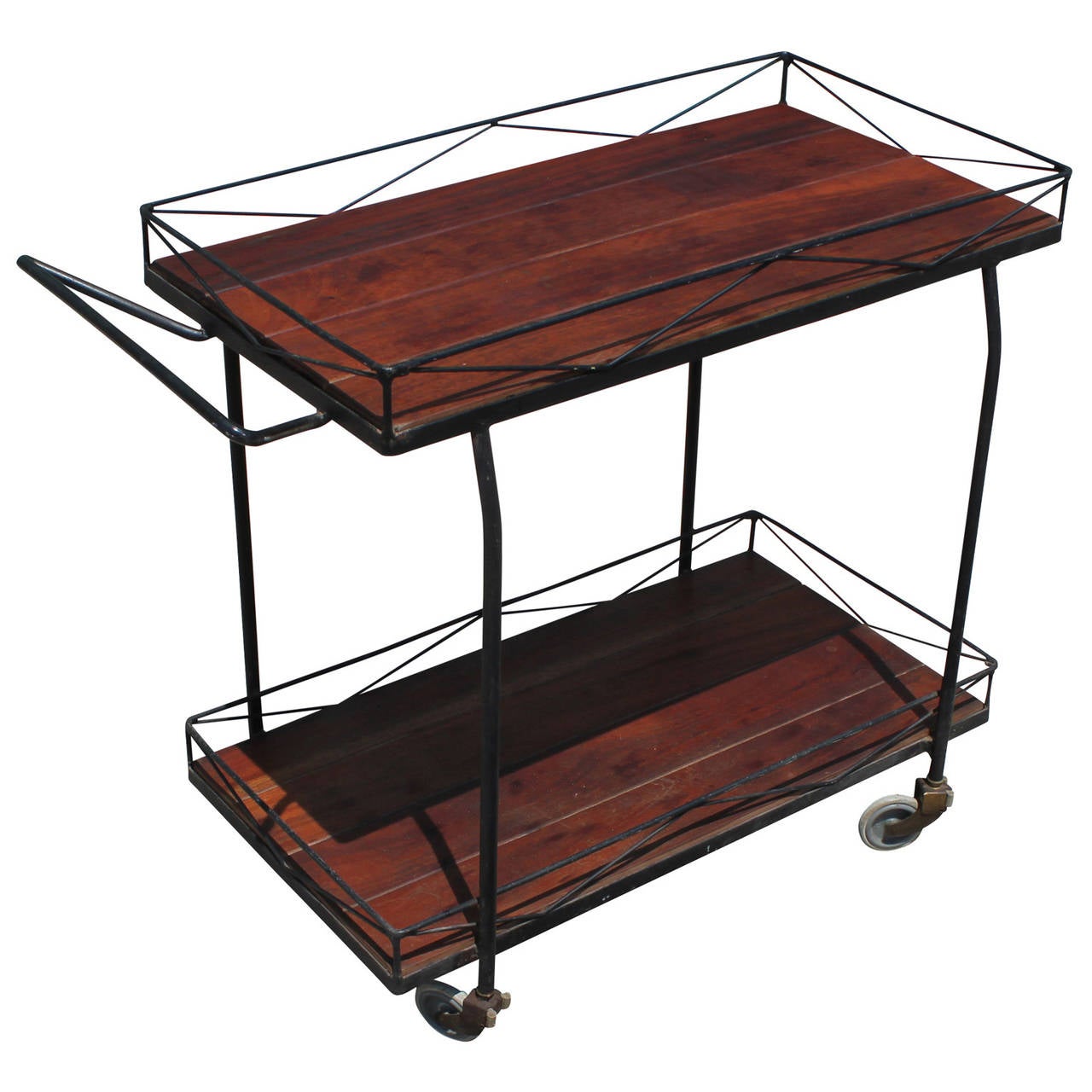 Excellent bar cart in black metal and rustic wood. Cart has an Tony Paul or Arthur Umanoff feel and would be great in an industrial or modern home.