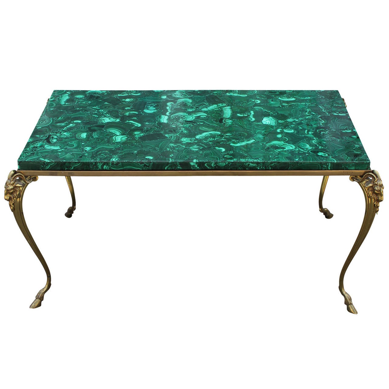 Absolutely stunning malachite topped brass french table with rams heads and feet. Table was made in early 20th century. Malachite top is stunning.