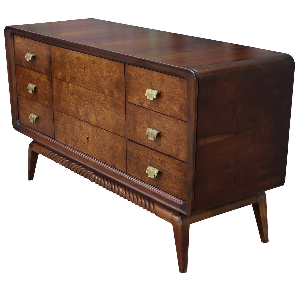 Beautiful Italian Dresser with a two-tone finish. The front Drawers are in a curly grained wood and the shell is Walnut. A  brass key is is used to open the three middle drawers.  Stunning piece from all angles.