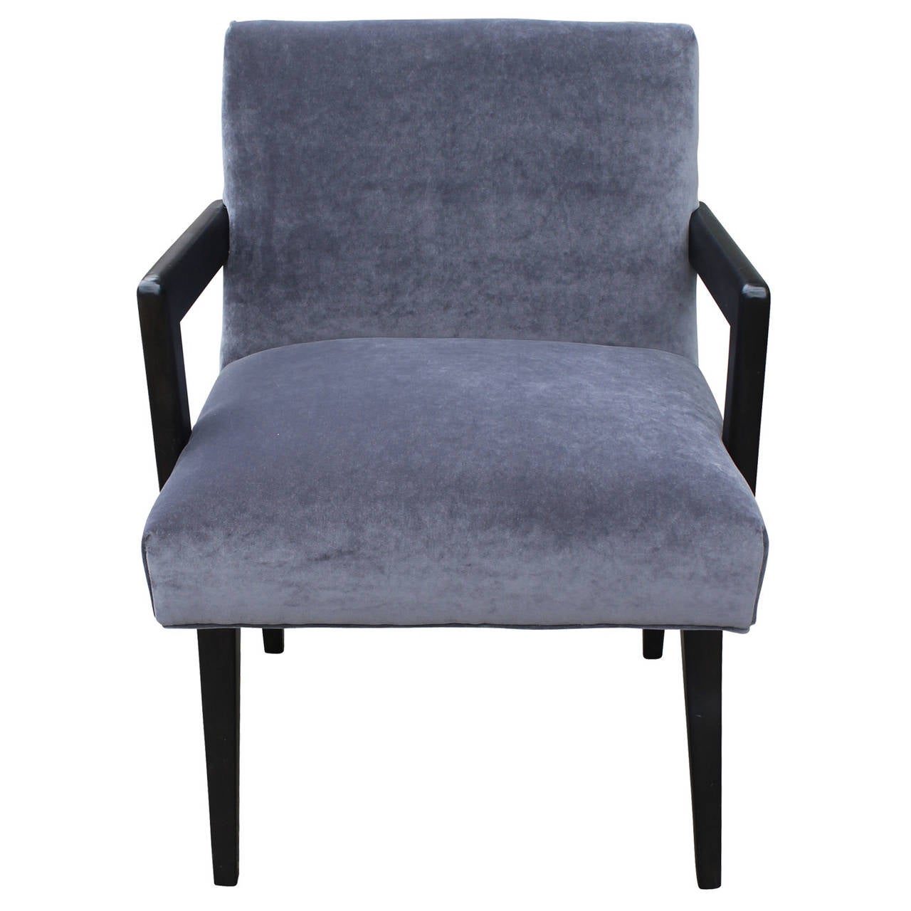 Great Armchair freshly upholstered in luxe grey velvet. Arms and legs are finished in a glossy black stain. Chair has great lines and negative space.
