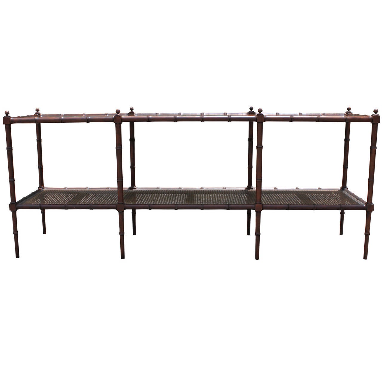 Great console table, sofa table, or shelf by Baker. Table has eight delicate faux bamboo legs topped with round finials. A single cane shelf provides storage. Table top has a lovely walnut grain. In beautiful vintage condition.