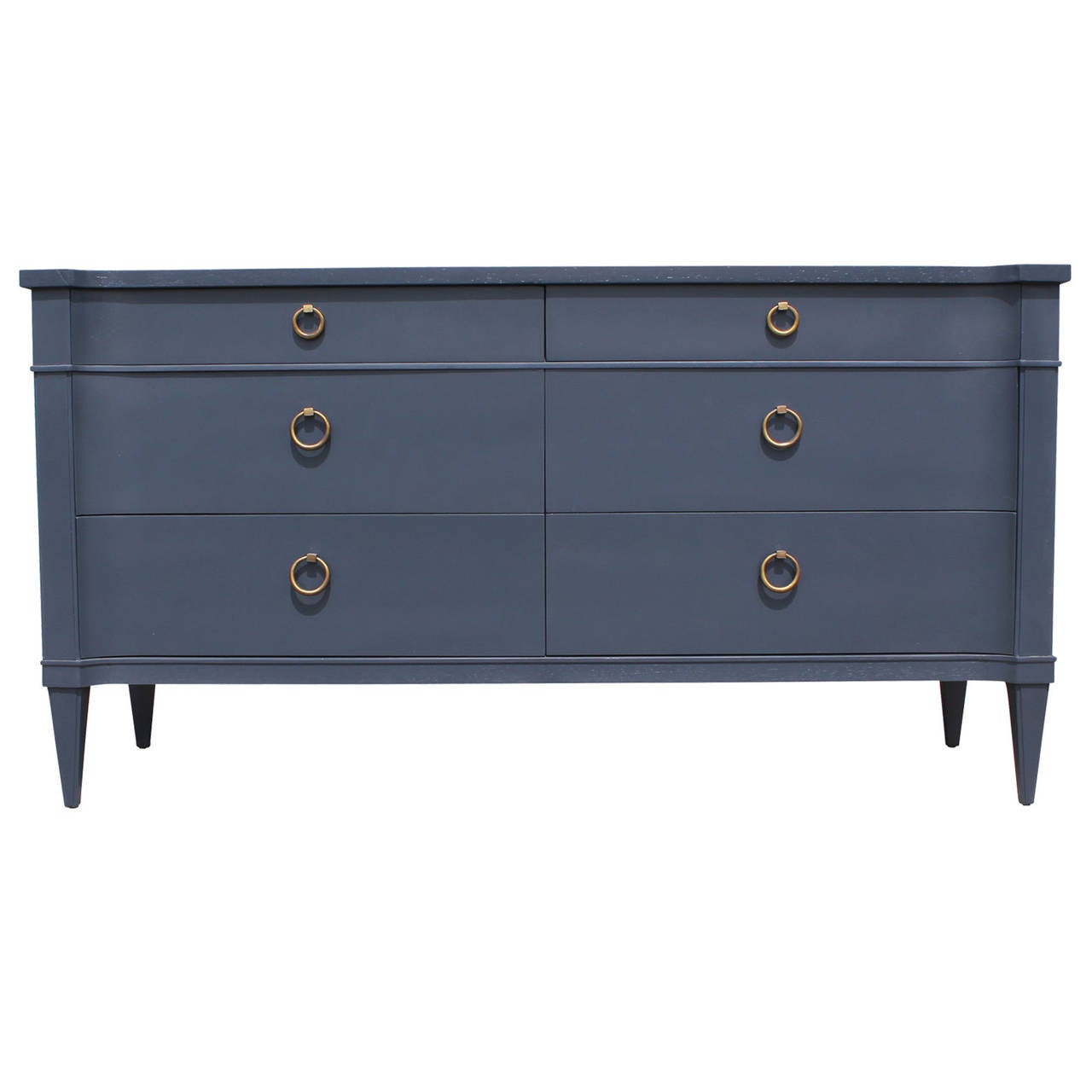 Stunning French blue grey dresser made by Drexel. The Chest has nice patinaed brass ring handles. A slight curve to the front adds visual interest.