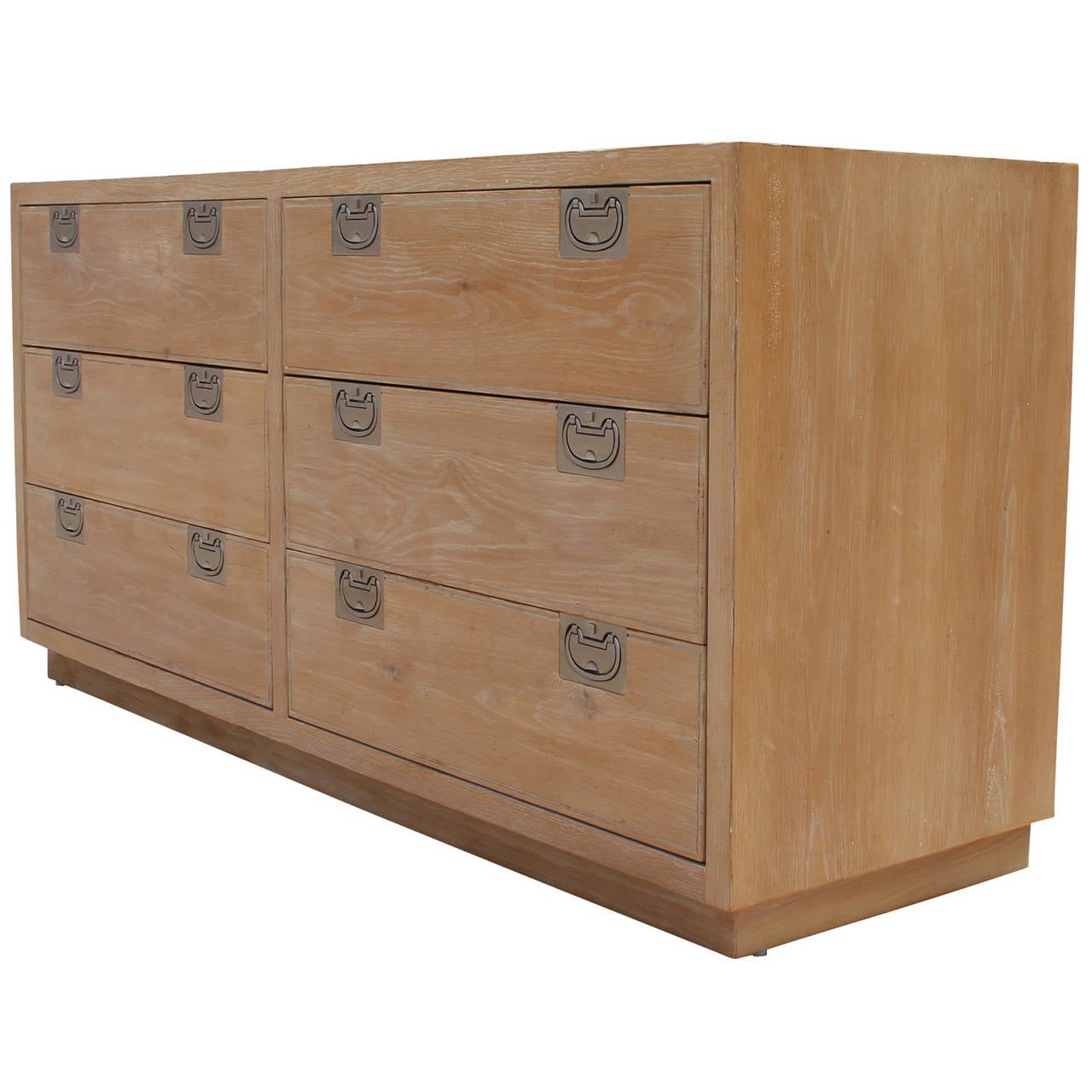 Fabulous blonde wood campaign style dresser by Henredon. Dresser has 6 drawers-top right drawer is slotted. Piece is accented with soft brass campaign style pulls.