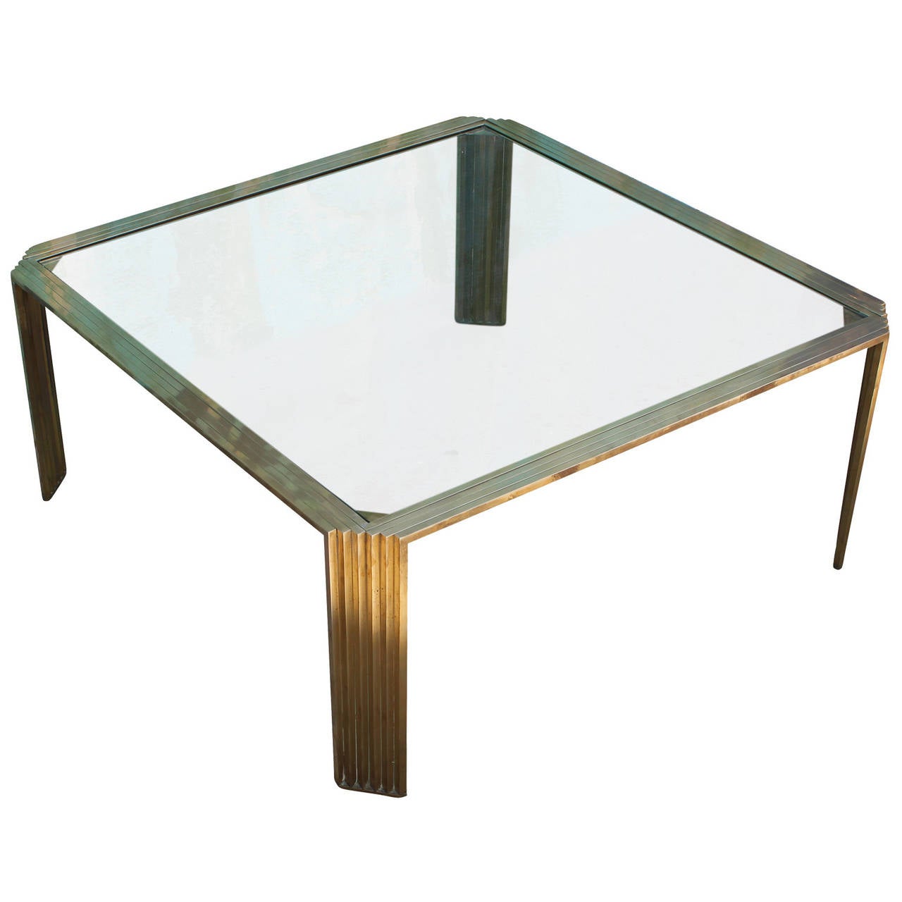 Incredible solid brass Romeo Rega style square coffee table with a glass top. Made in Italy the table in excellent vintage condition. Table can be highly polished or allowed to patina to a more bronze color.