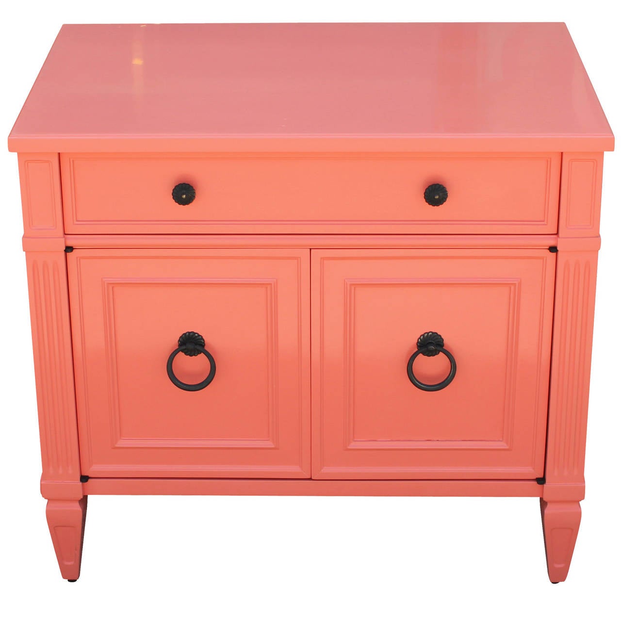 Charming pair of Henredon night stands freshly lacquered in bold coral color. A single drawer and cabinet provide ample storage. Interior of cabinet is finished in lacquer lacquer as well. Black metal hardware provides nice contrast. Bedside 