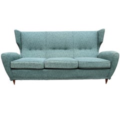 Sculptural Mid Century Modern Italian Wingback Sofa with Tapered Legs
