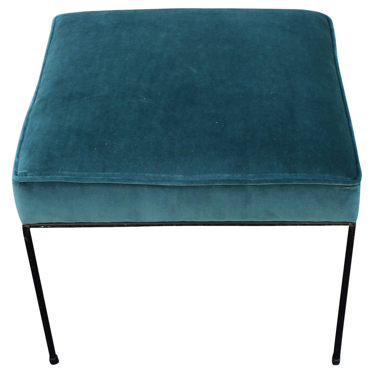 Beautiful pair of stools or ottomans by Paul McCobb. Wrought iron bases are in nice vintage condition. Stools are freshly upholstered in a luxe teal velvet.