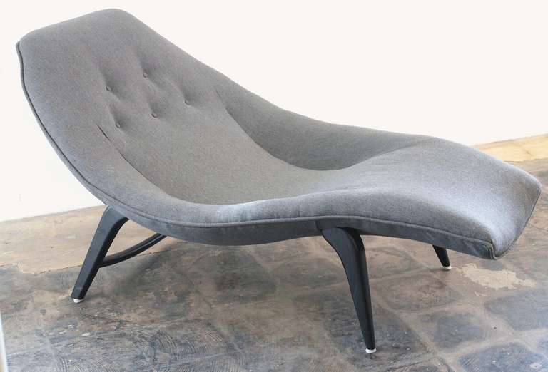 Incredible sculptural wave form chaise or lounge chair, in the style of Adrian Pearsall & Vladimir Kagan. Fully restored in grey Sunbrella fabric, with black painted legs. Possibly Italian, and very comfortable.