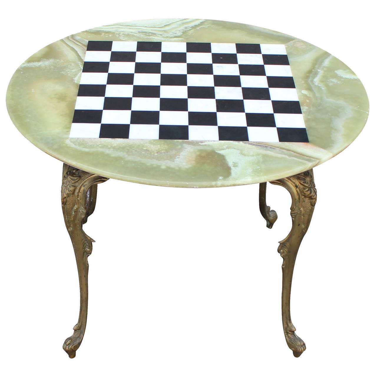 Lovely small onyx and brass game table. Could be used in between two chairs. In excellent vintage condition.