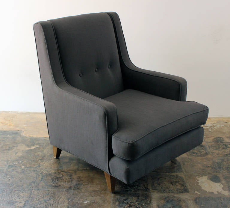 High back Edward Wormley For Dunbar lounge chair restored in a clean linen fabric. The legs are made of light colored mahogany.