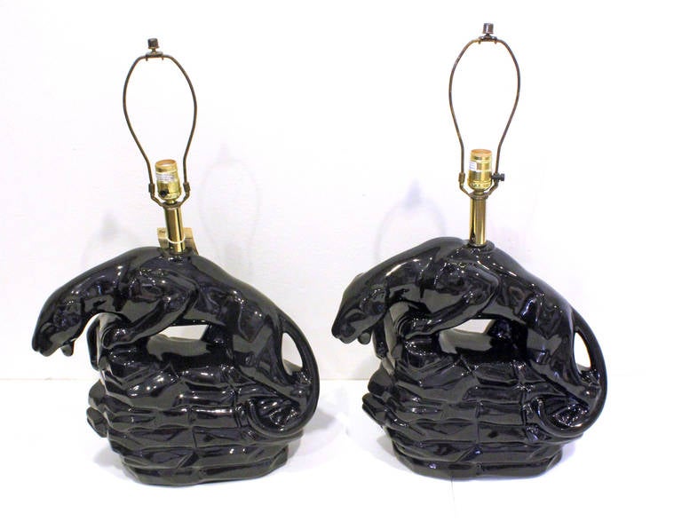 Fine pair of black panther lamps with original hangtag by Harris Lamps. Statement piece for any room, in excellent condition.