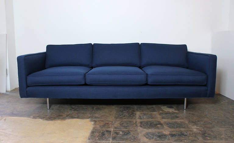 Beautiful even arm sofa by Milo Baughman for Thayer Coggin. Restored in a woven navy blue fabric with round chrome legs.
