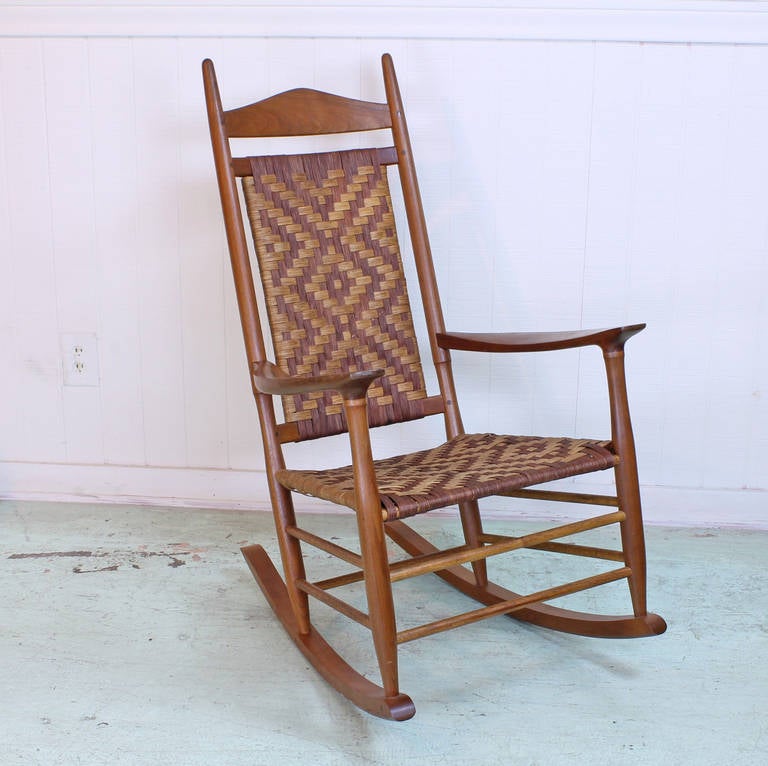 Beautiful custom made rocking chair one of a kind. Craftsmanship and detail is top quality. Woven back and seat circa 1960s. Danish / Scandinavian style but believed to made in US. Excellent vintage condition.