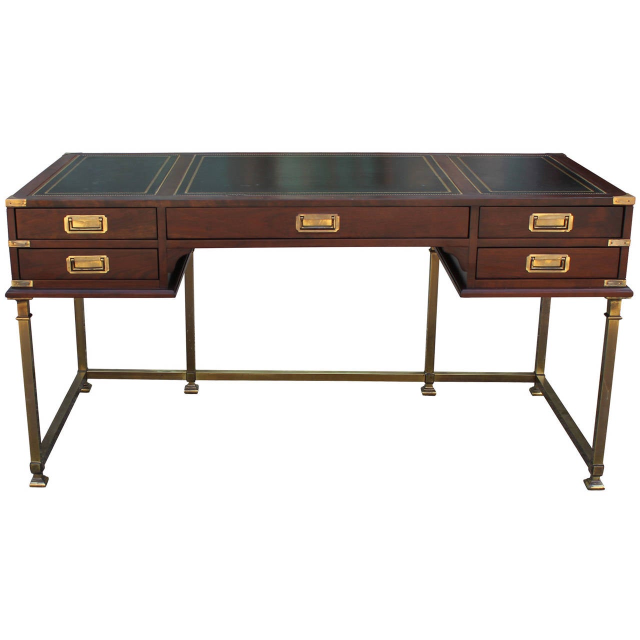 Fabulous campaign style desk by Sligh-Lowry. Desk rests upon a brass base which complements the brass hardware and accents. Desk top is covered in a gold detailed black leather. Leather shows some slight wear in spots but is overall in great shape.