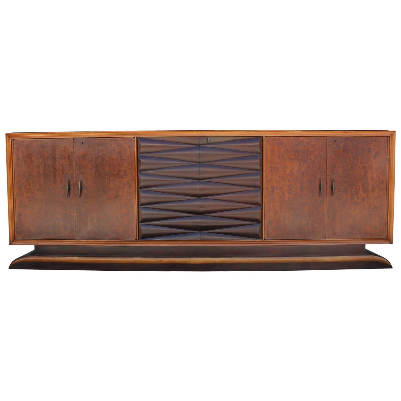 Glamorous deco style Italian sideboard from the 1930s-1940s. Sideboard has a beautiful attention to detail with quilted doors. Right and left cabinet doors are in burl wood, while the center cabinet doors are intricately carved. Right cabinet doors