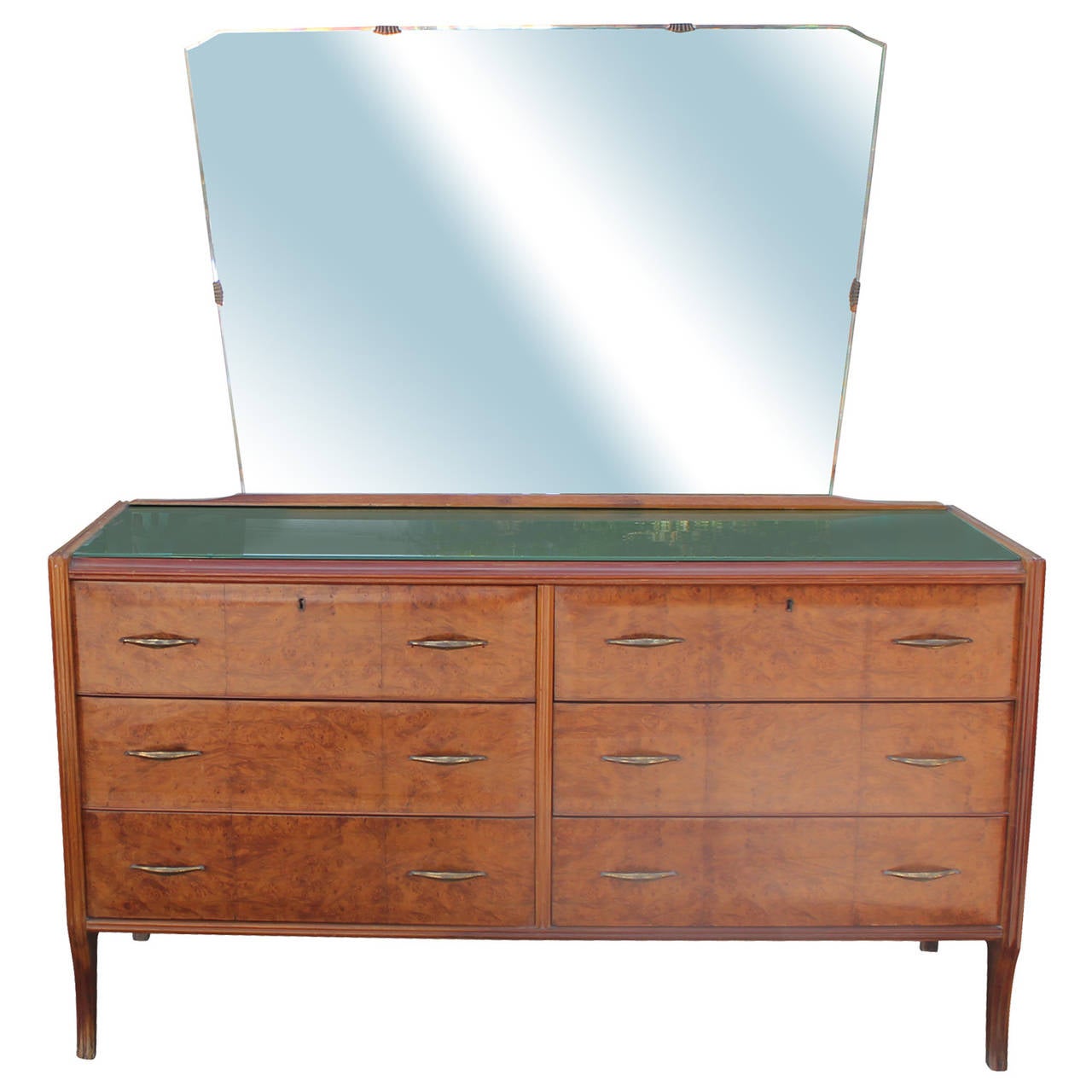 Fabulous Italian dresser or vanity finished in a gloss. Dresser has a stunning profile and brass hardware. Dresser is topped in green glass. Six drawers provide excellent storage. When the mirror is removed two holes are exposed in the top back-