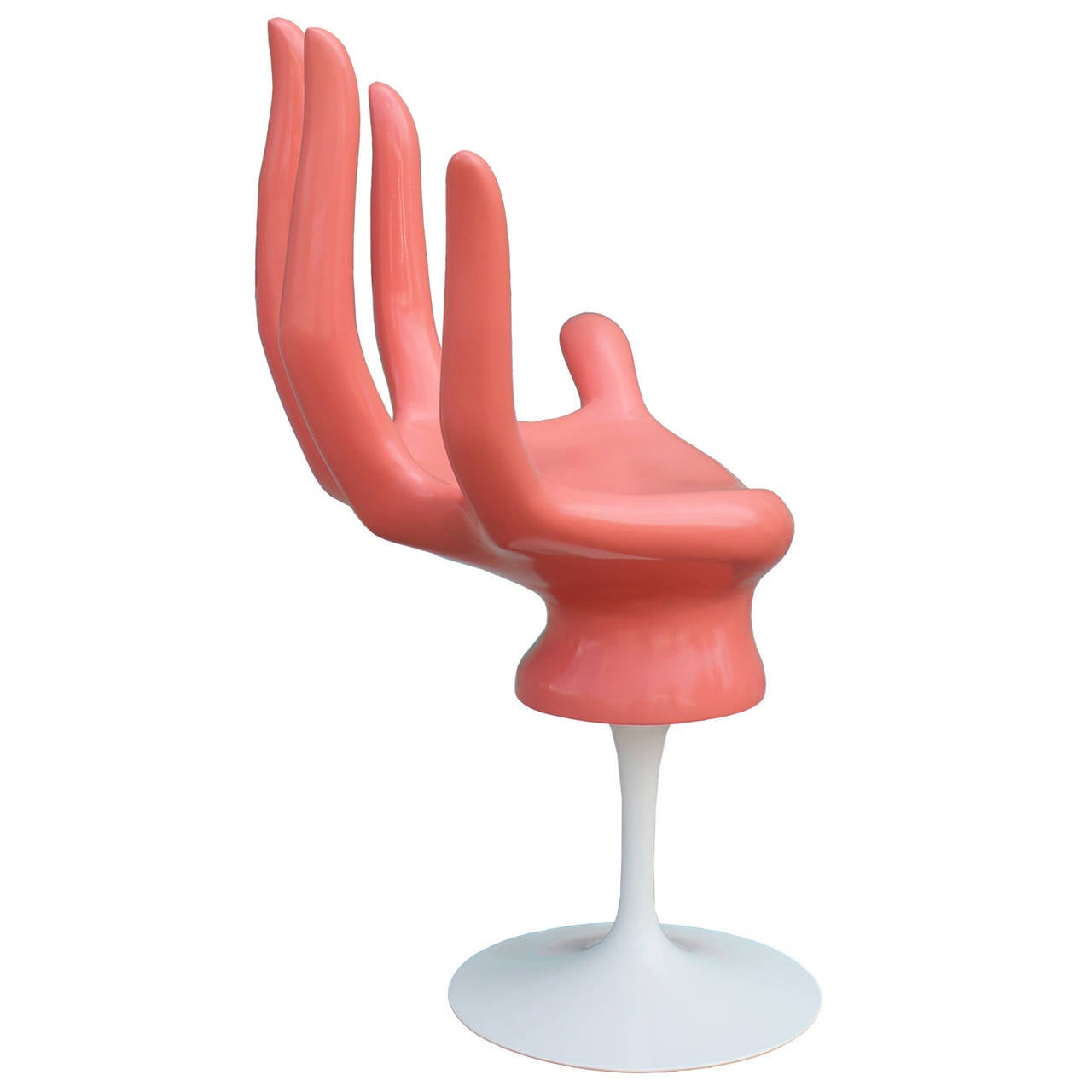 Eye-catching hand shaped swivel chair. Chair is lacquered in coral and sits upon a white lacquer tulip style base. Chair looks incredible from every angle. Great statement piece!