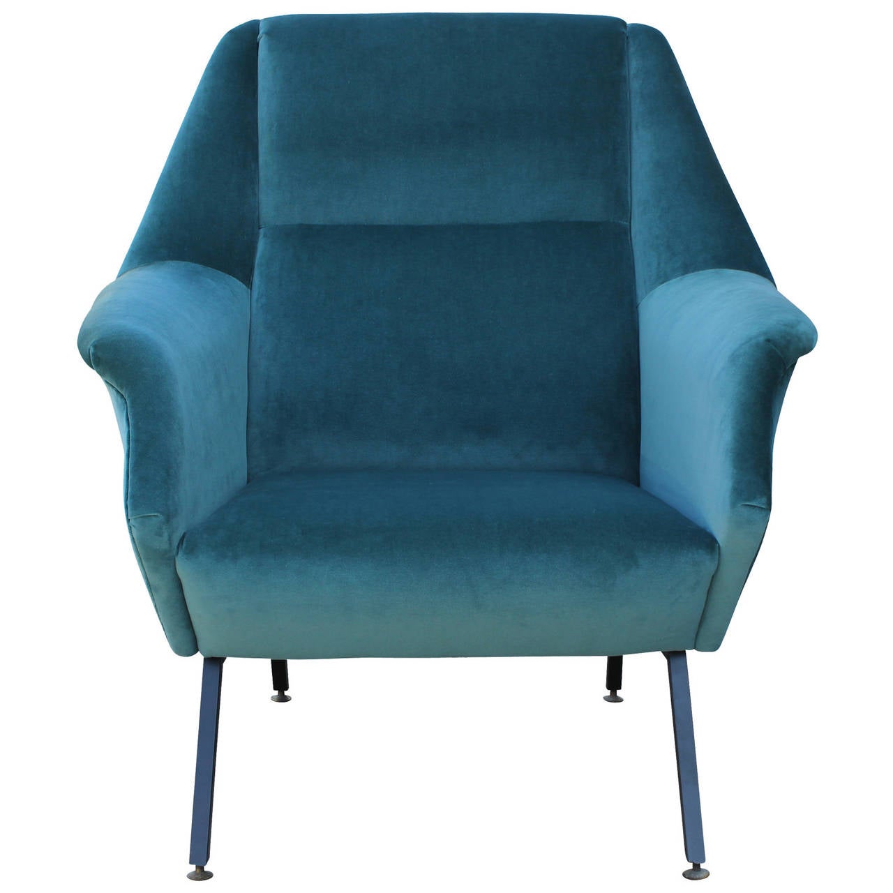 Beautiful pair of sculptural Italian lounge chairs in the style of Marco Zanuso or Gio Ponti. Chairs are freshly upholstered in a luxe teal velvet. Thin black metal legs add contrast.