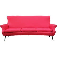 Modern Curved Red Italian Sofa with Metal Legs and Brass