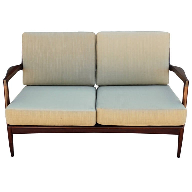 Restored Kofod Larsen Settees by Selig in excellent condition. Restored in Sunbrella fabric. Excellent Set! Would consider splitting up the set. Made in Denmark. Also documented as Poul Jensen.