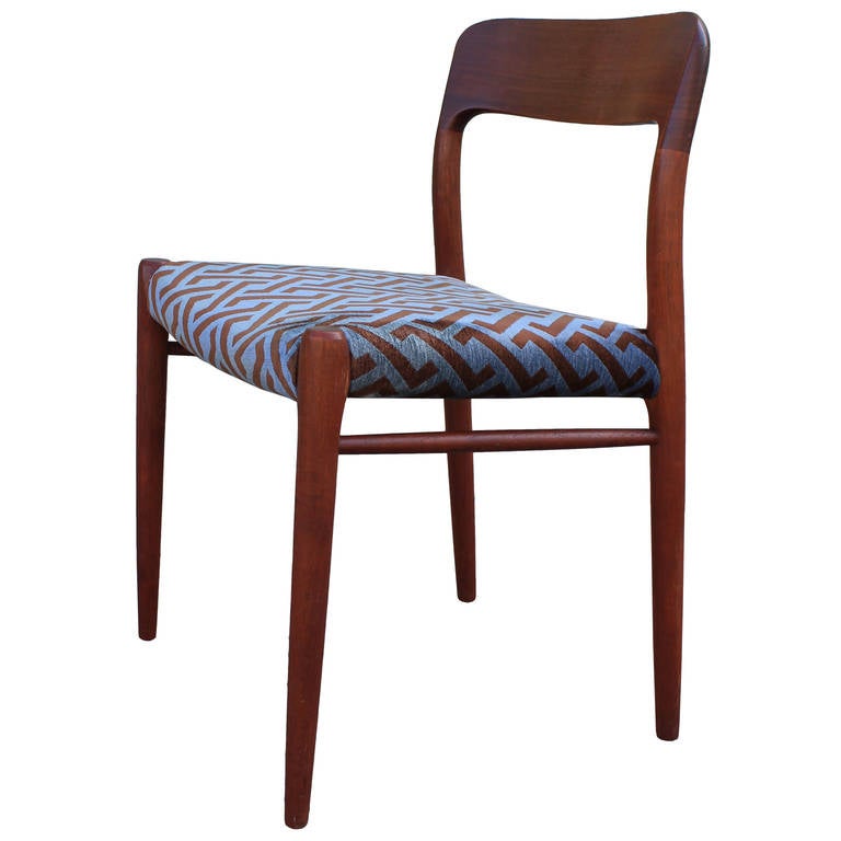 Great set of 6 JL Moller dining chairs in Teak. Recently recovered in David Hicks fabric. Extra single chair available.