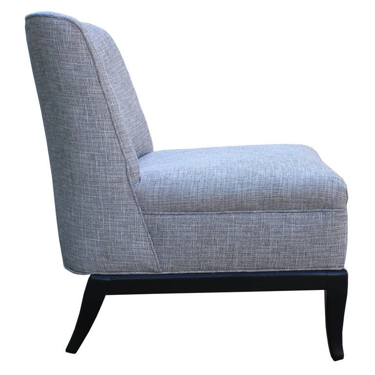 Restored Pair of TH Robsjohn-Gibbings for Widdicomb style  slipper chairs. Chairs have been restored in a light grey women fabric and a black lacquered base.