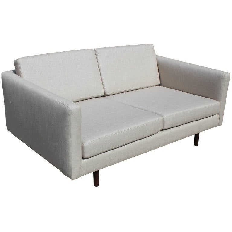 Harvey Probber loveseats / settee with Brazilian rosewood legs. Loveseat has new foam and fabric. Fabric is a light colored woven linen blend.