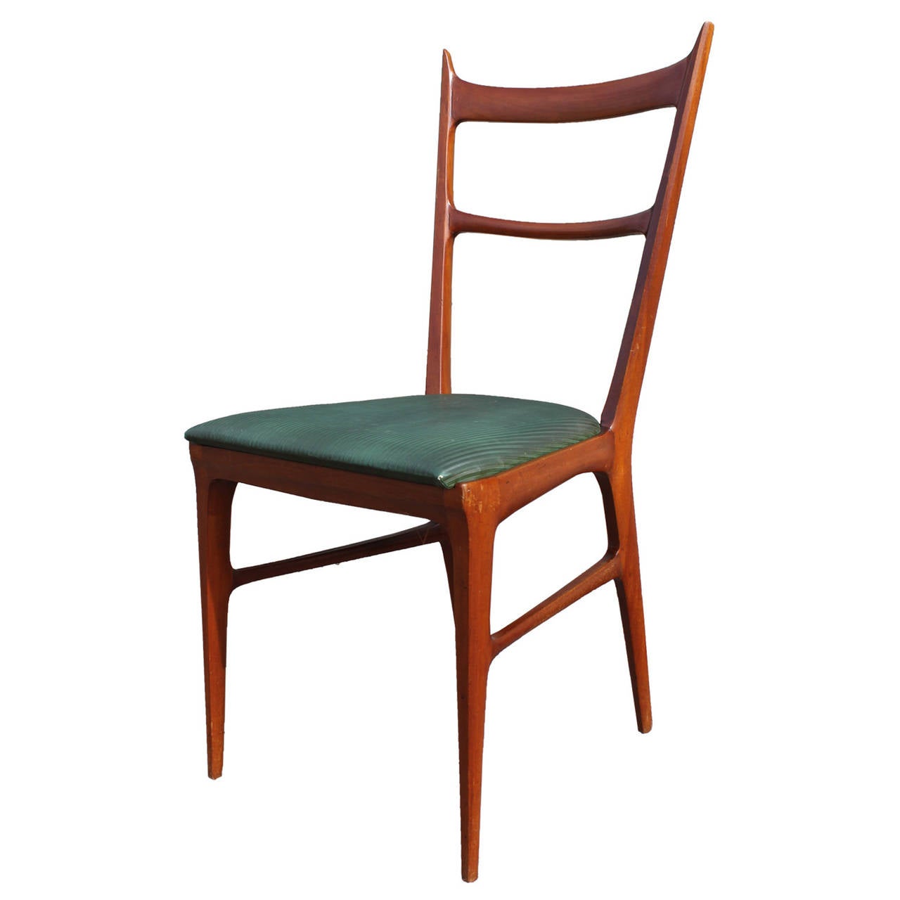 Beautiful set of four Carlo Di Carli Dining Chairs with splayed legs and angled backs. Light Restoration is recommended. Chairs are in good vintage condition.