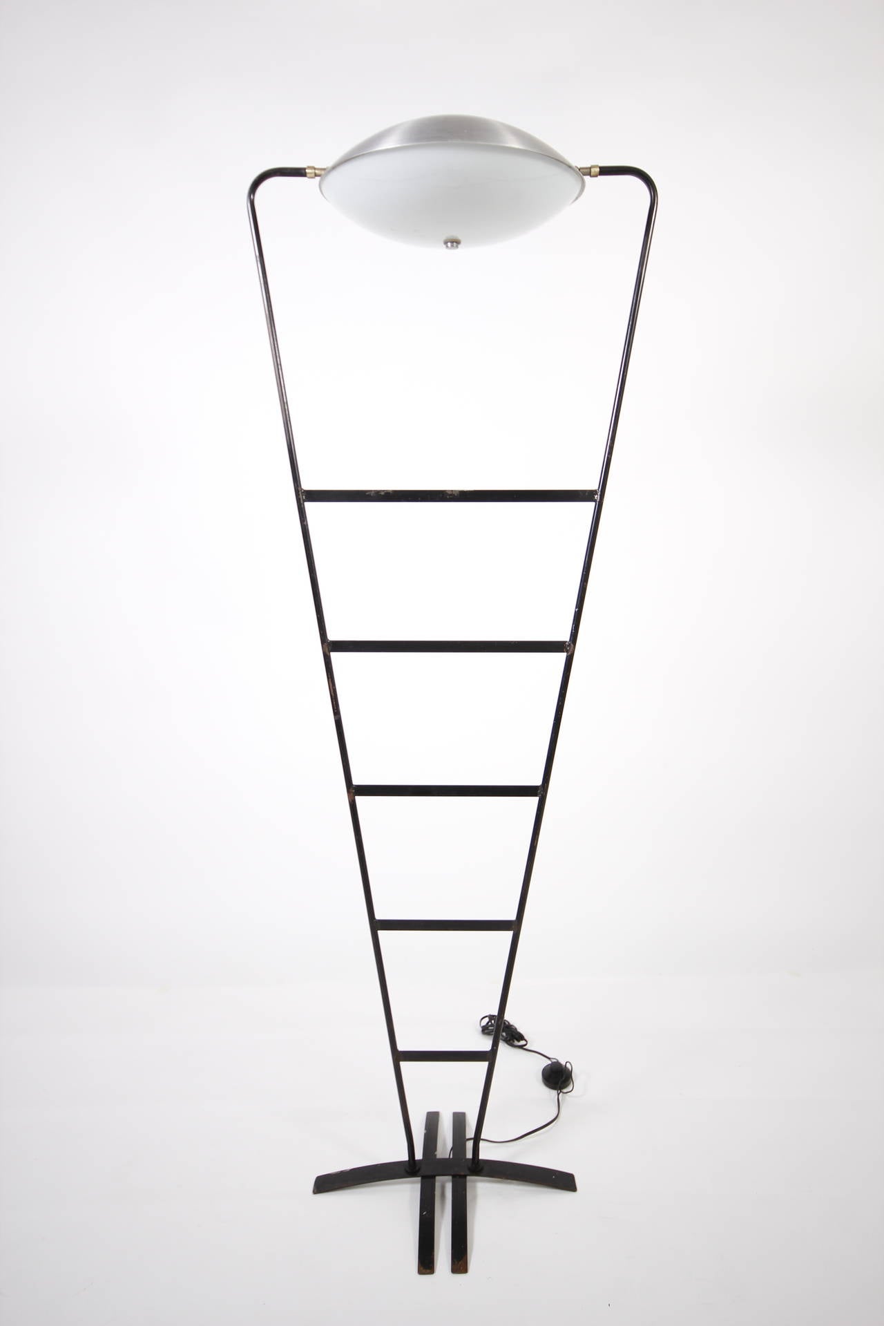 Very unusual modernist iron floor lamp in the manner of Jean Royère.