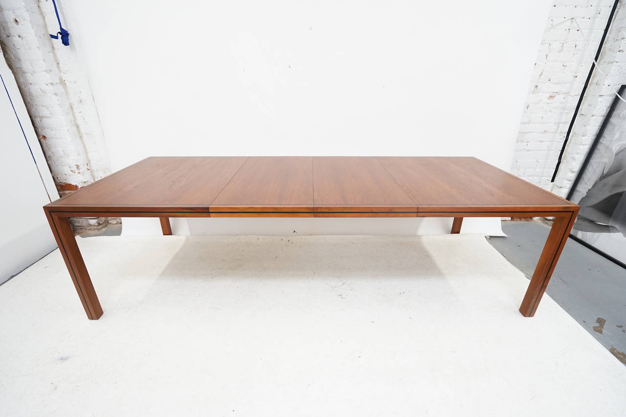 Very large walnut with black lucite inlay running the length of the table and amazing walnut grain, Designed by Milo Baughman for Arch Gordon, Comes with two 20