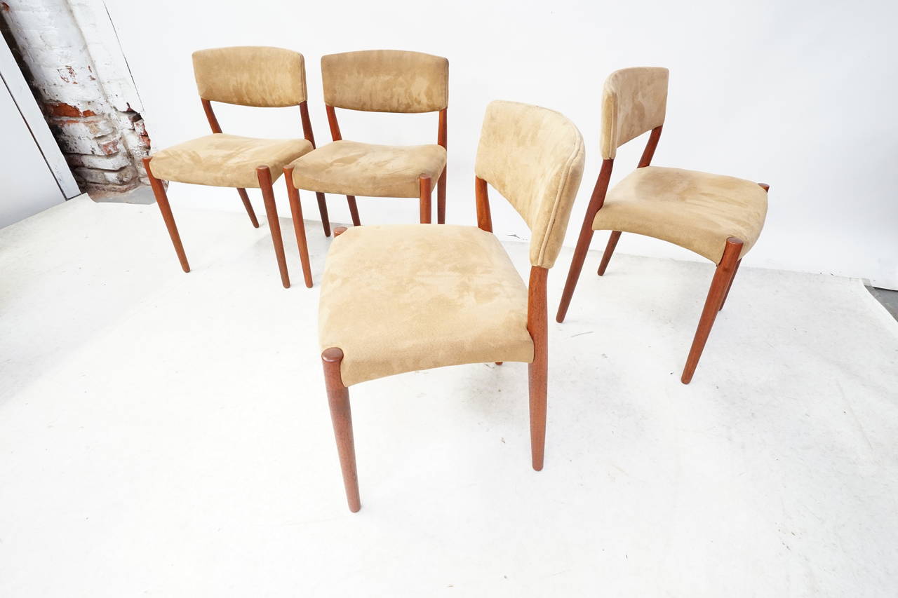 Teak and leather dining room chairs or side chairs designed by Einar Larsen and Bender Madsen for master cabinetmaker Willy Beck. I also have the two leather armchairs or captain’s chairs available and the 72