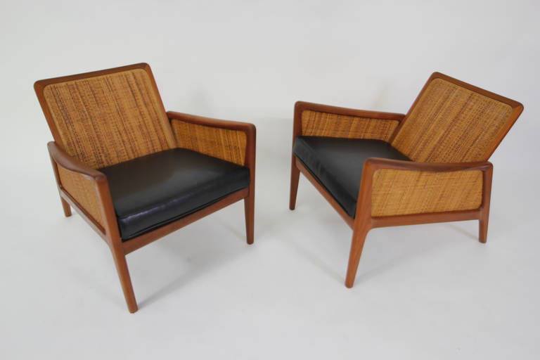 A gorgeous pair of rare teak & cain Lounge Chairs by Peter Hvidt & Orla Molgaard Nielsen, Model FD 151