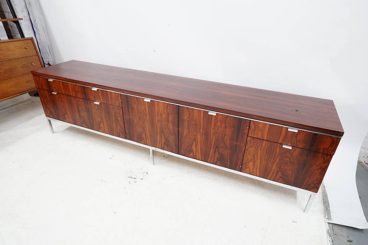 Absolutely stunning and massive 8 foot Florence Knoll Brazilian rosewood credenza with polished chrome base, extremely rare to find a 96