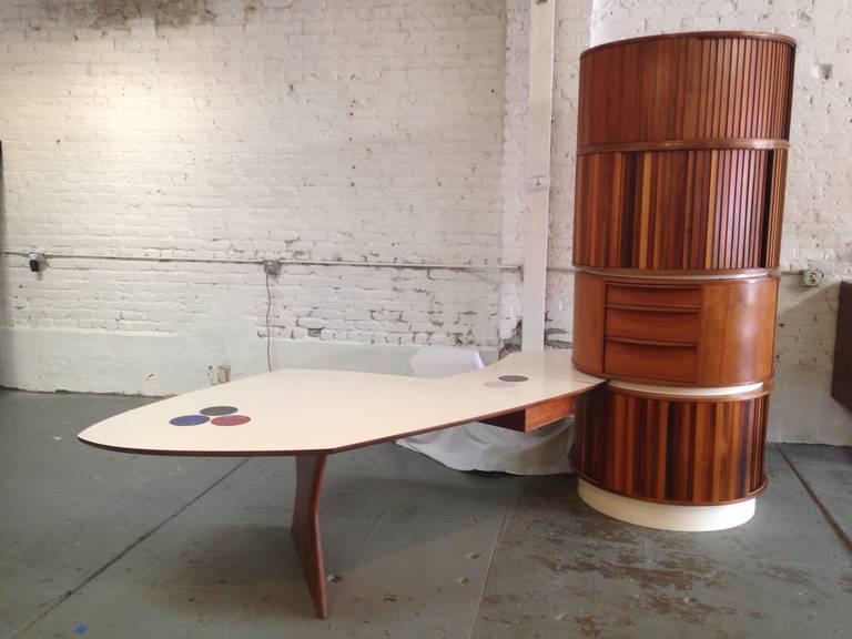 One Off Custom Desk with Original Stereo and Turn Table Designed by 1950s New York Based Interior Designer Samson Berman. The Top Two Sections Rotate and Hide a Space for a TV. Each Section has Tambour Doors that Reveal Rotating Bookshelves and Room