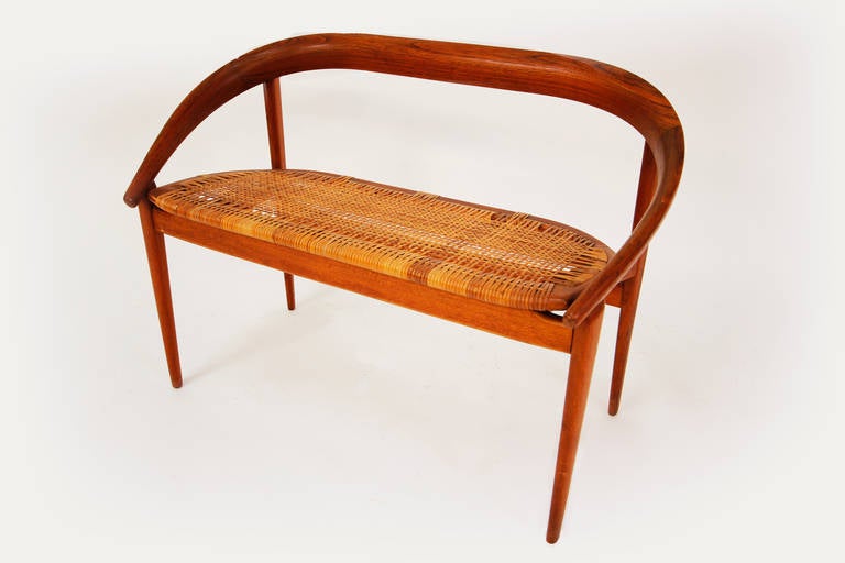 Sculptural teak and woven cain 2 seater bench or sette