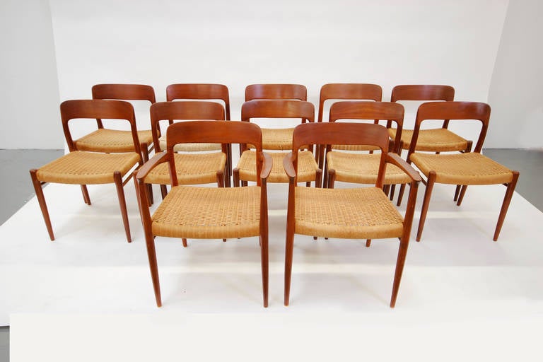 Gorgeous set of 12 Neils Otto Moller solid teak dining chairs with danish cord 
2 captains chairs and 10 side chairs, I also have a Hans Wegner dining table original to the set
