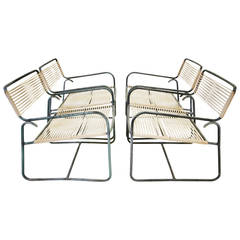 Four Bronze Wide Lounge Chairs with Ottoman by Walter Lamb