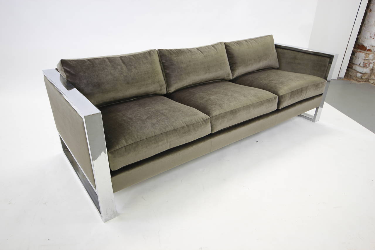 Stunning Milo Baughman wide chrome bar sofa with new silver-grey velvet upholstery. Chrome is in near mint condition with minor patina.