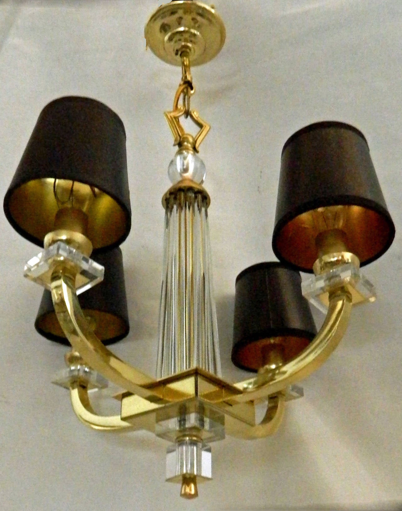 Rare pair of Jacques Adnet chandeliers, glass rods central part and square cabochon in a brass frame.
Exceptional set of six chandeliers available.
Provenance: Parisian Hotel.
$ 3450 for one chandelier.
Four lights, 60 watts bulb max each.
Four